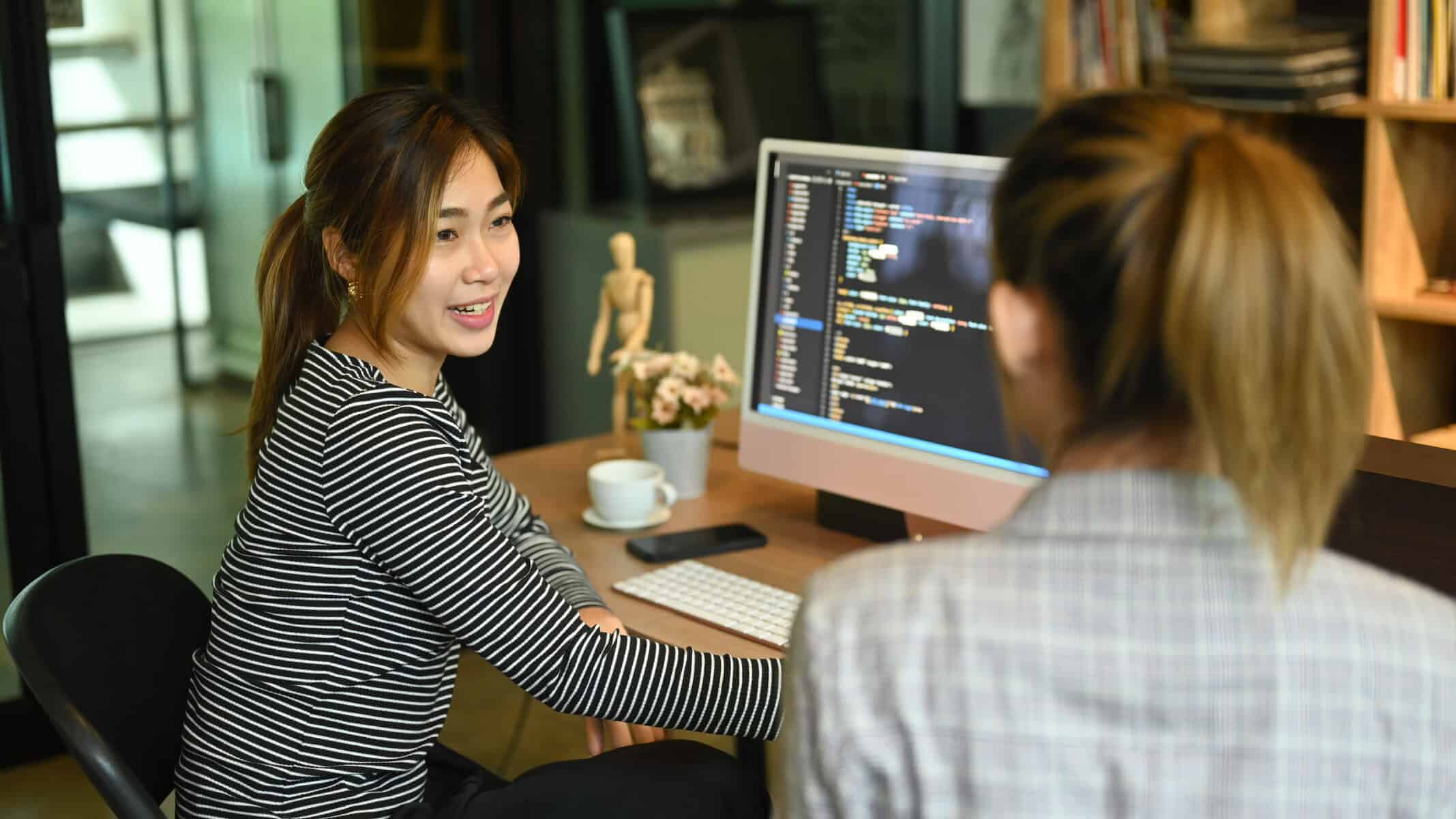 a team of web developers redesigning a website